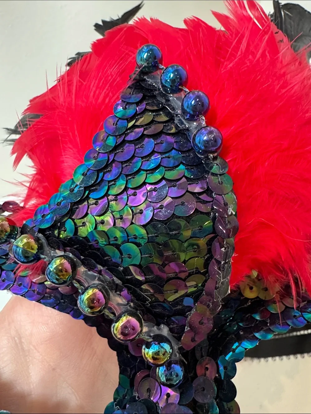 Handmade sequined and feathered mask from New Orleans.